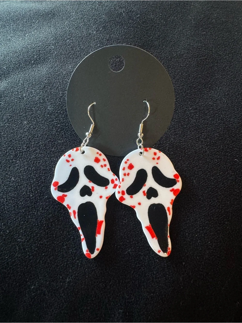 White & Black Scream Skull Earrings with Red Accents